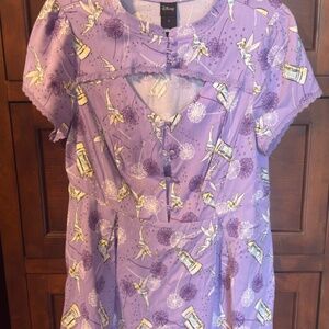 With a pinch of fairy dust...Tinkerbell and Peter Pan whimsical top